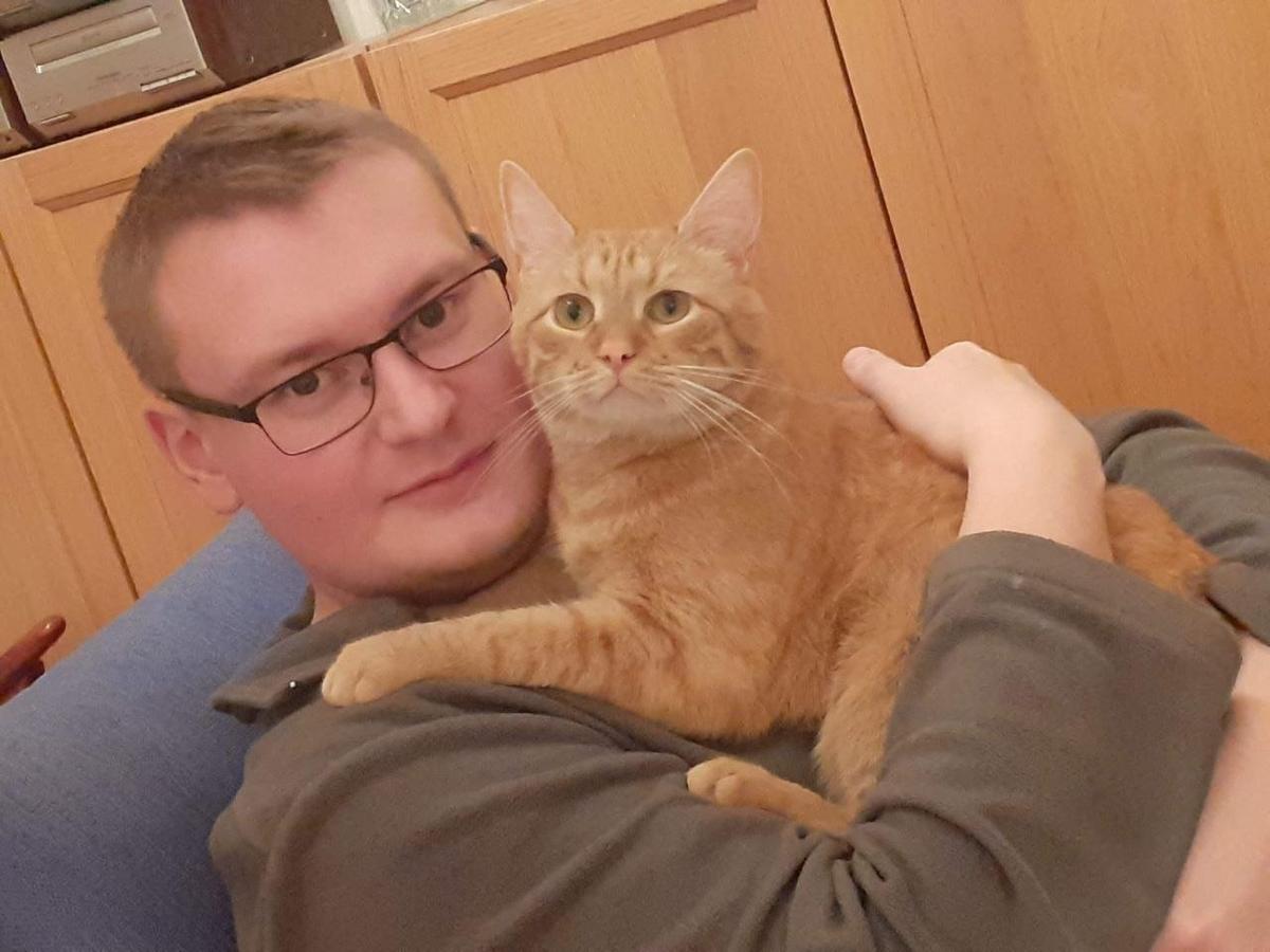 Василий** с котом Руфусом до ареста. Фото: соцсети